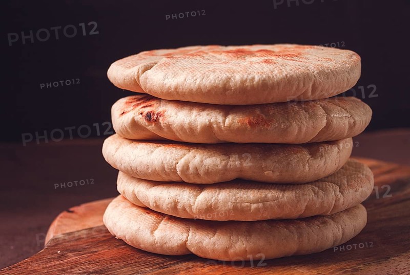 Pita bread, stack, on the table, no people