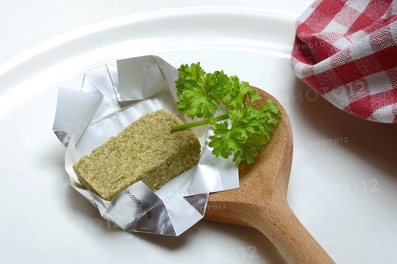 Stock cube with cooking spoon, soup cube