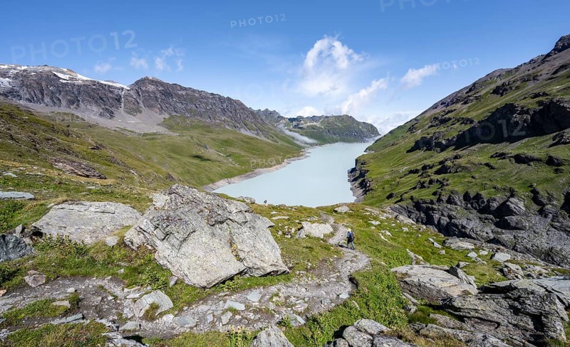 Hiking trail in idyllic mountain landscape with Lac des Dix reservoir, Valais Alps, Valais, Switzerland, Europe