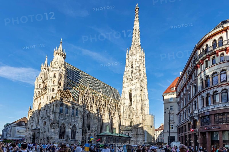 Side view of St Stephen's Cathedral in Vienna with many people in the foreground, Vienna