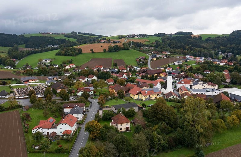 Drone shot, view of village with church, Enzenkirchen, Innviertel, Upper Austria, Austria, Europe