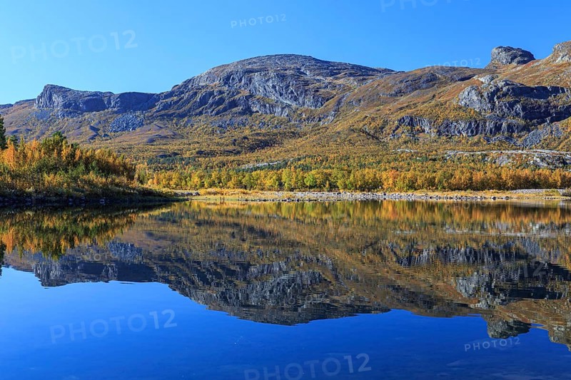 Mountains reflected in lake, autumn colours, sunny, bright, Stora Sjöfallet National Park, Laponia, Lapland, Sweden, Europe