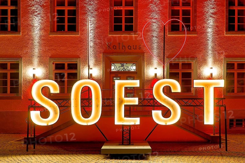 Illuminated town hall with Soest lettering in the evening at the Winterstrahlen Festival of Lights in Soest, North Rhine-Westphalia, Germany, Europe