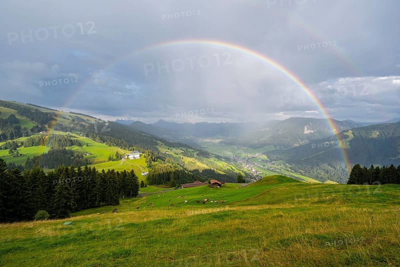 View over the Brixen Valley with rainbow, Hochbrixen, Brixen im Thale, Kitzbühel Alps, Tyrol, Austria, Europe