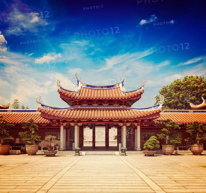 Vintage retro effect filtered hipster style travel image of gates of Lian Shan Shuang Lin Monastery, Singapore, Asia