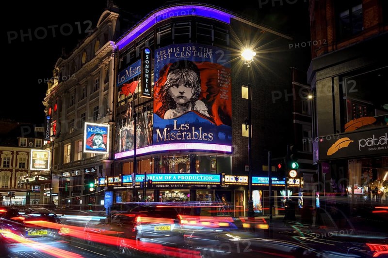 Traffic at night outside the Sondheim Theatre, Les Misérables, Musical, West End, London, England, United Kingdom, Europe