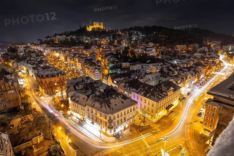The lights of the snow-covered town of Marburg an der Lahn glow in the evening, Wetterau, Marburg, Hesse, Germany, Europe