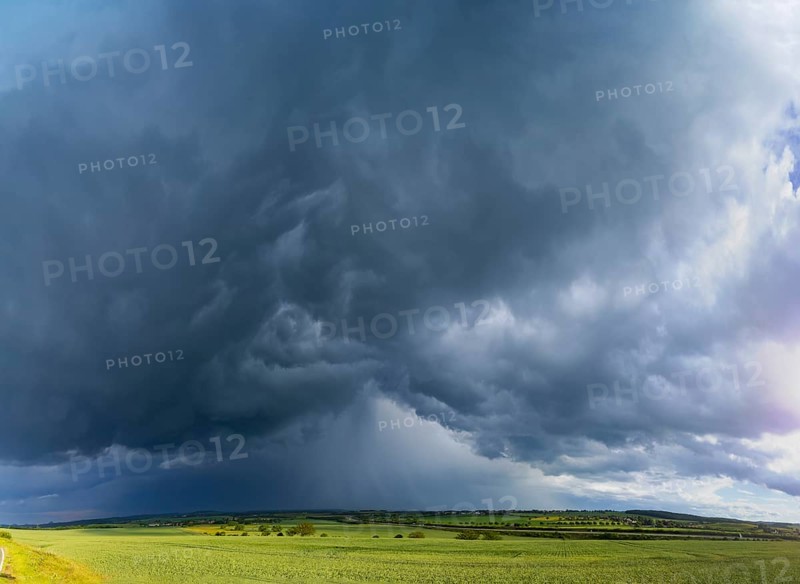 Thunderstorm cell with rainbow over fields near Krebs in the Osterzgebirge, Krebs, Saxony, Germany, Europe
