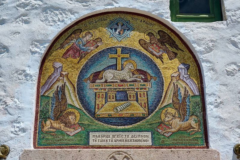 A religious mosaic with Christian symbols and angels, decorating a stone wall in a Catholic church, evangelist symbols, lion, bull, eagle, lamb, Monastery tis Apokalipsis, Patmos, Dodecanese, Greek Islands, Greece, Europe