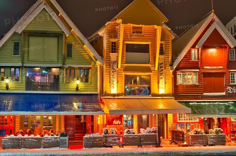 People sitting in front of a bar, winter, chrismas decoration, cold, gas powered heating stove keeps guests warm, Stavanger, Rogaland, Norway, Europe