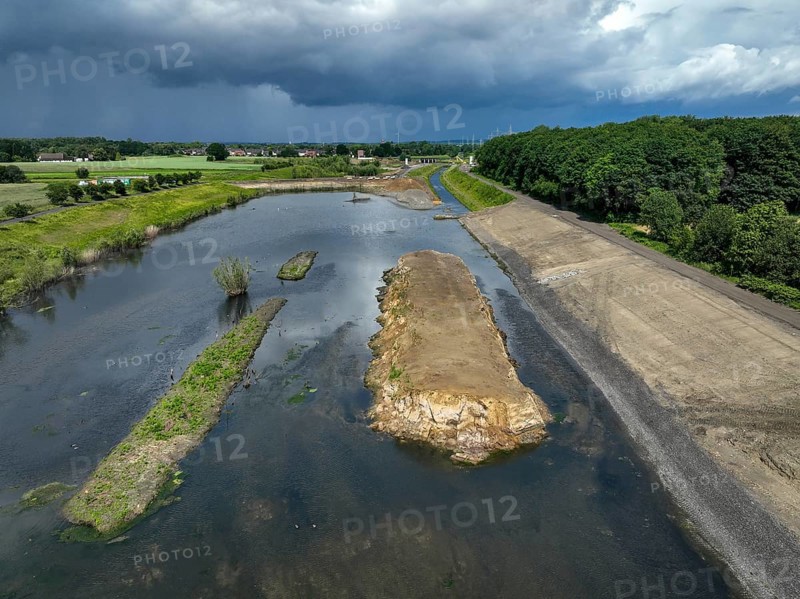 Dortmund / Castrop-Rauxel, North Rhine-Westphalia, Germany, river renaturalisation, renaturation of the Emscher, flood retention basin HRB Mengede. A new floodplain landscape is being created at the Emscher-Auen farm, expanding the area for flood protection during heavy rainfall and for biodiversity. The Emscher, which is currently straightened, will be given curves again and can meander through its new floodplain. Following the construction of a parallel sewer, the Emscher has been completely free of wastewater since 2022. The river was previously an open, above-ground combined sewer with rainwater and wastewater, Europe
