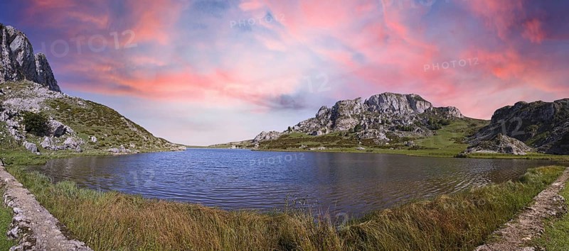 Panoramic of the beautiful lake of Covadonga in Asturias, a beautiful spring sunset, Picos de Europa. Spain