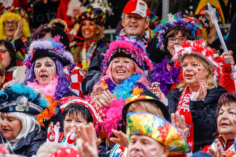 Colourfully costumed carnivalists celebrate carnival in Cologne, on Weiberfastnacht the street carnival is traditionally opened on the Alter Markt, which then reaches its climax on Rosenmontag, Cologne, Rhineland, North Rhine-Westphalia, Germany, Europe