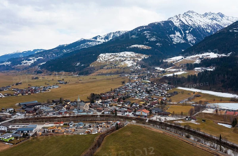 Drone image, residential buildings, view of village with parish church, Niedernsill, Salzach, Pinzgau, Salzburg province, Austria, Europe
