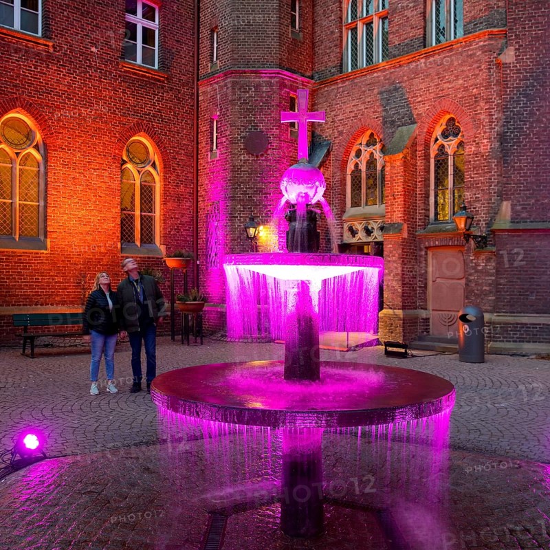 Kevelaer in the light, light installation inner courtyard of the confessional chapel with fountain in the evening, Kevelaer, Lower Rhine, North Rhine-Westphalia, Germany, Europe