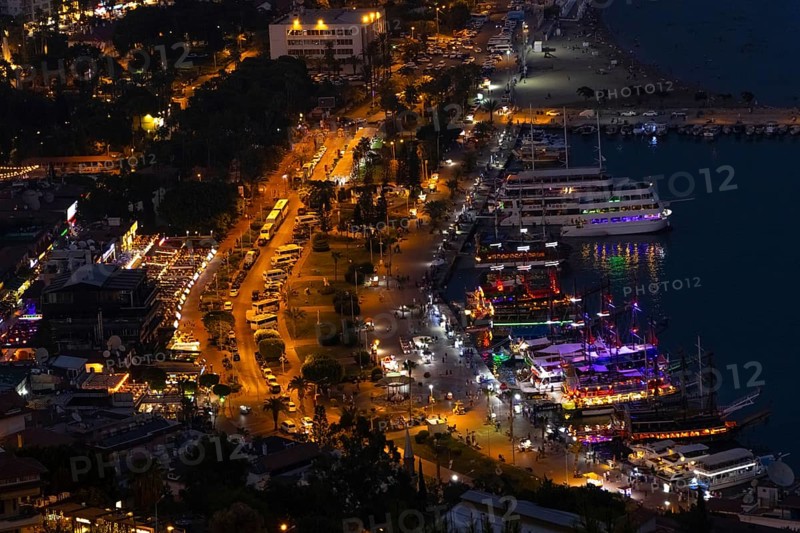 The lights in the harbour of Alanya Turkey shine in the evening, Alanya, Antalya, Turkey, Asia