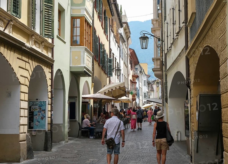Merano, South Tyrol, Italy, passers-by stroll through the Laubengasse, the arcades are the heart of the old town centre, Europe