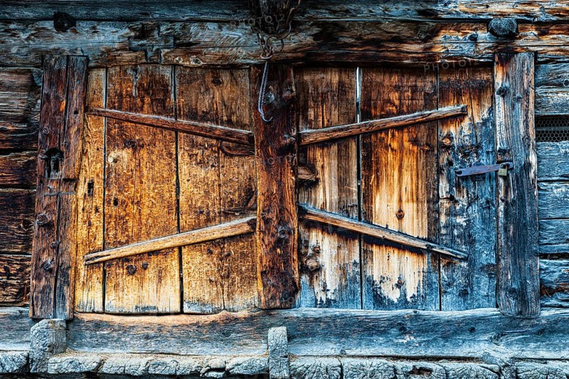 Weathered loading door of an old hay barn, Grimentz, Val d'Anniviers, Valais Alps, Canton Valais, Switzerland, Europe