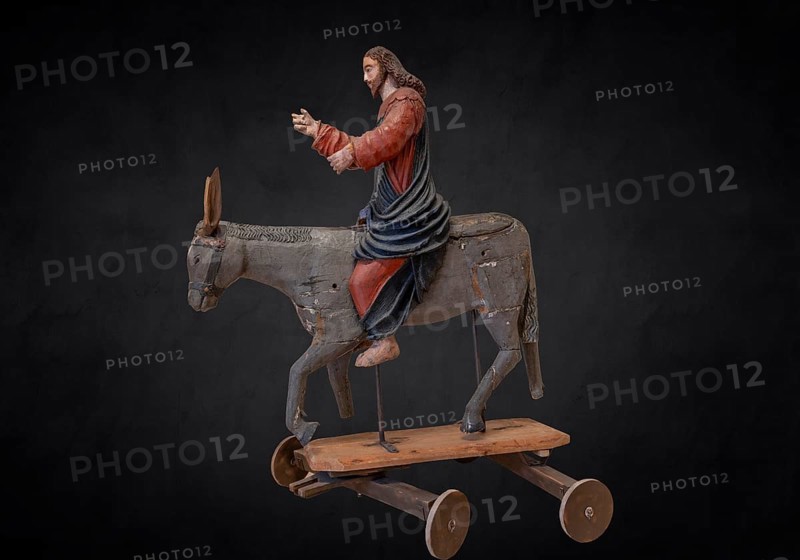 Christ on the palm donkey, on a dark background, wooden figure from around 1400, Museum Bezau, Vorarlberg, Austria, Europe
