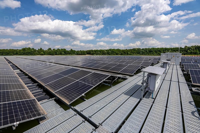 Germany's largest floating solar power plant on the Silbersee III, a quarry pond no longer used for sand mining, near Haltern am See, operated by Quarzwerke GmbH, around 5800 solar modules, on an area of a good 2 football pitches, generate 3.1 megawatts of power, the company uses the electricity itself on weekdays, at weekends it flows into the public grid, North Rhine-Westphalia, Germany, Europe
