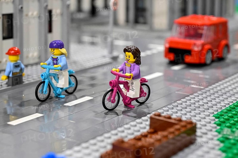 Lego figure with bicycle