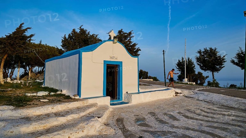 Profitis Ilias Chapel, White and blue chapel in Greece, surrounded by trees on a sunny day, Anthony Quinn Bay, Vagies Bay, Rhodes, Dodecanese, Greek Islands, Greece, Europe