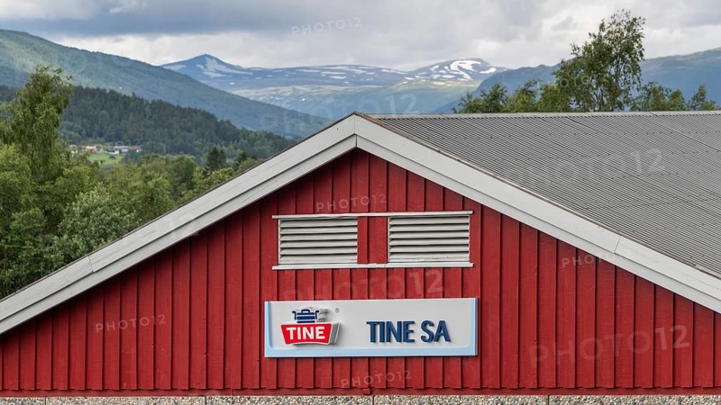 Red building of the Tine dairy, largest dairy in Norway, Dovre, Fylke Innlandet, Upper Gudbrandsdalen, Norway, Europe