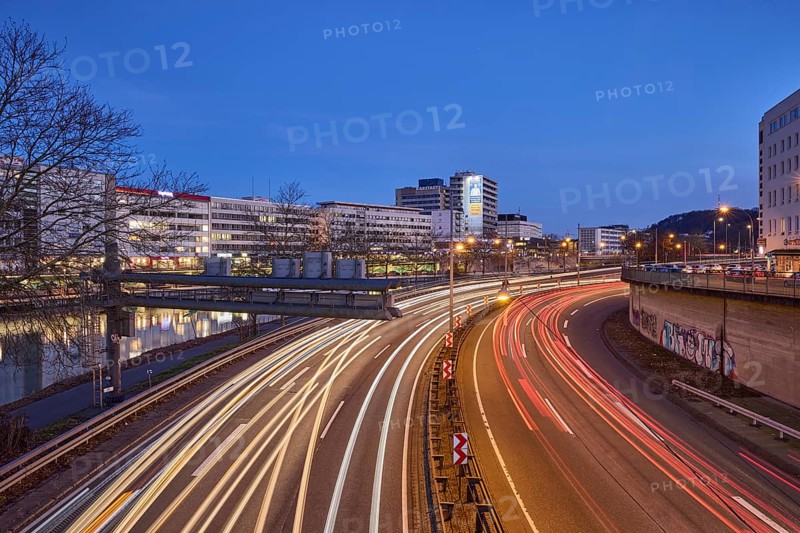 Motorway, modern architecture, river Saar, light traces, reflectors, headlights, blue hour, blue evening sky, cloudless, motorway 620, Saarbrücken, state capital, regional association Saarbrücken, Saarland, Germany, Europe