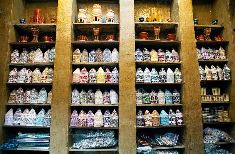 Shop for kumma or traditional caps in the souk or soug or market in the old town of Nizwa, ad-Dachiliyya region, Oman, Asia