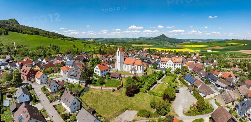 Aerial view, panorama, view of the municipality of Weiterdingen in Hegau with the church of St Mauritius, on the left the Hegau volcano Hohenstoffeln, on the right on the horizon the Hohenhewen, district of Constance, Baden-Württemberg, Germany, Europe