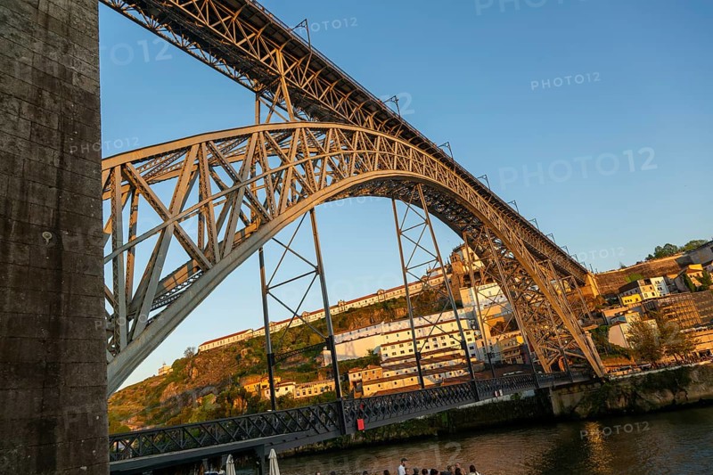 Golden hour at Dom Luis I Bridge crossing River Douro to Vila Nova de Gaia, Porto, Portugal, Europe 1886, Europe