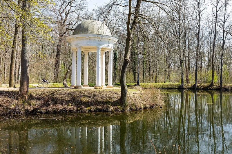 Diana Temple in Lützschena Castle Park with reflection in the water, Leipzig, Saxony, Germany, Europe