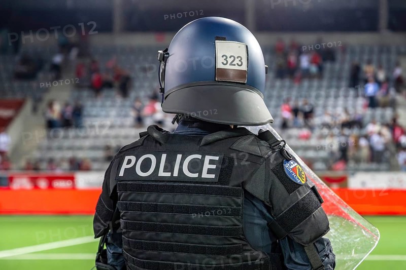 Police officer in combat gear Football stadium