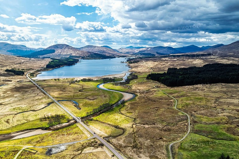 Mountains and Moors over Loch Tulla and River Orchy from a drone, Highlands, Scotland, UK