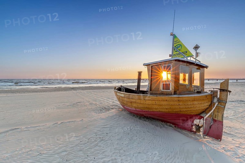 Traditional wooden fishing boat on the beach along the Baltic Sea at Ahlbeck, Heringsdorf on the island Usedom, Mecklenburg–Western Pomerania, Germany, Europe
