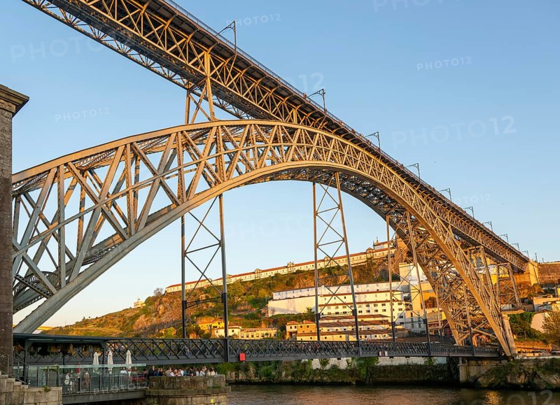 Golden hour at Dom Luis I Bridge crossing River Douro to Vila Nova de Gaia, Porto, Portugal, Europe 1886, Europe