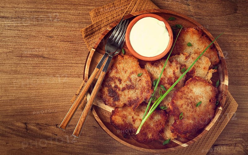 Potato pancakes, pancakes with sour cream, Belarusian dish, homemade, no people