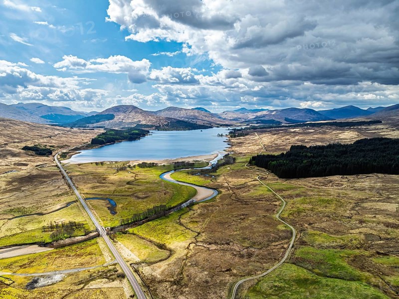 Mountains and Moors over Loch Tulla and River Orchy from a drone, Highlands, Scotland, UK