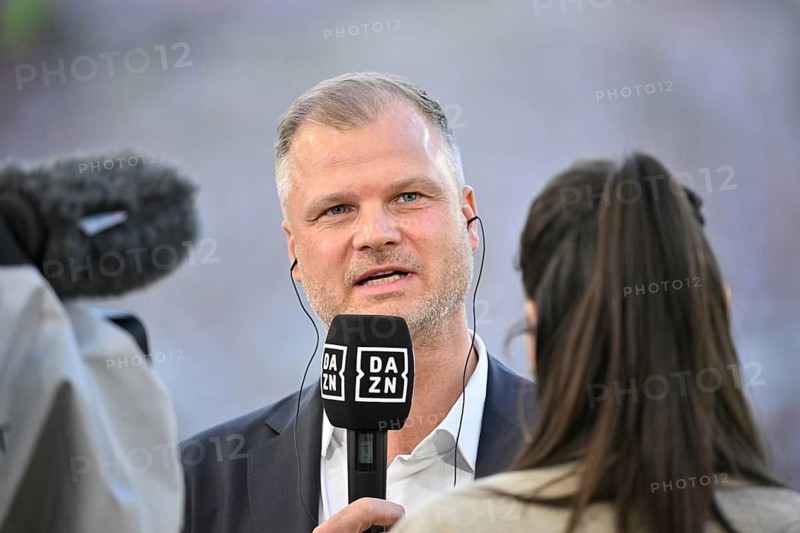 Chief Sports Officer Fabian Wohlgemuth VfB Stuttgart in front of TV camera in interview Microphone Logo with DAZN reporter Presenter Ann-Sophie Kimmel MHPArena, MHP Arena Stuttgart, Baden-Württemberg, Germany, Europe