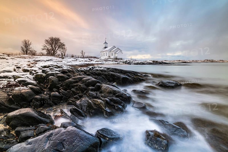 Gimsøy church in front of snow-covered mountains, Gimsoykirke, Gimsoy, Lofoten, Norway, Europe