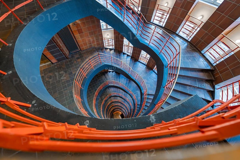 Spiral staircase with red banisters, vertical view downwards, SPRINKENHOF, Hamburg, Germany, Europe