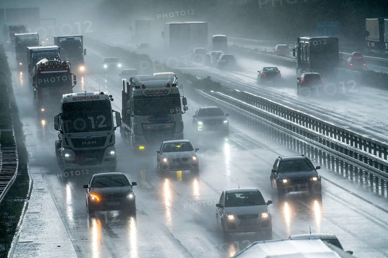 A2 motorway, at Recklinghausen motorway junction, heavy traffic during a thunderstorm, North Rhine-Westphalia, Germany, Europe