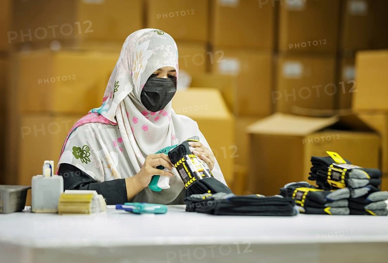 Employees of Inter Market Knit Private Limited producing socks. Lahore, 22.08.2024. Photographed on behalf of the Federal Ministry for Economic Cooperation and Development