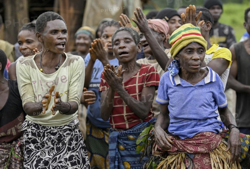 Pygmy woman of the BaAka people dancing and singing, Libongo, Est region, Cameroon, Africa