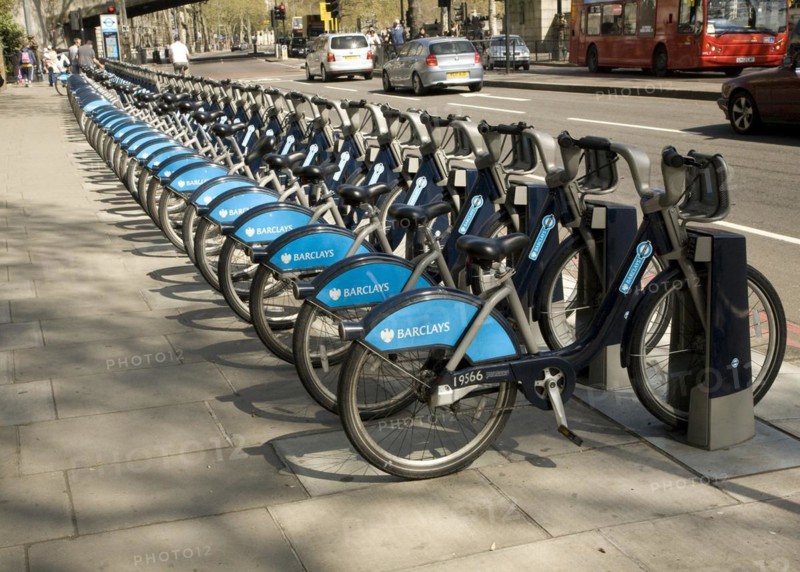 Racks of bikes available for rental under Barclays bicycle hire scheme, London