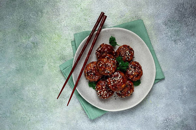 Tsukune, Japanese meatballs, minced chicken, fried on a skewer, with yakitori sauce, homemade, no people