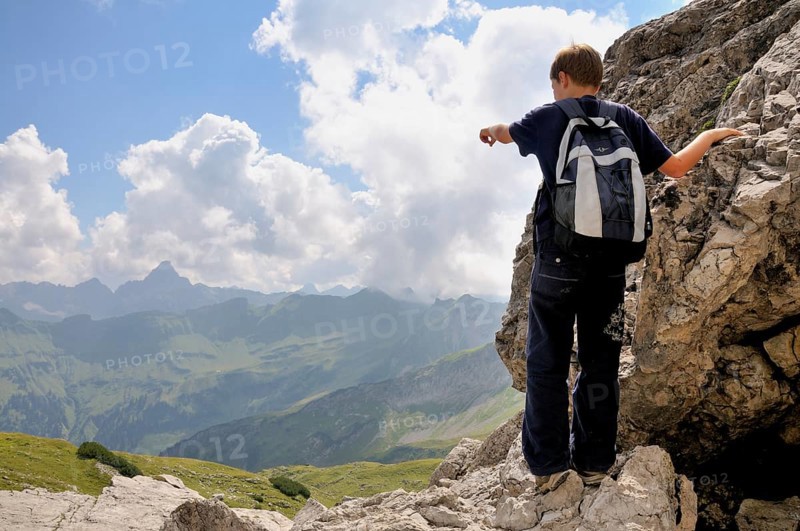 Ten-year-old boy hiking, Nebelhorn, Allgäu Alps, Bavaria, Germany, Europe