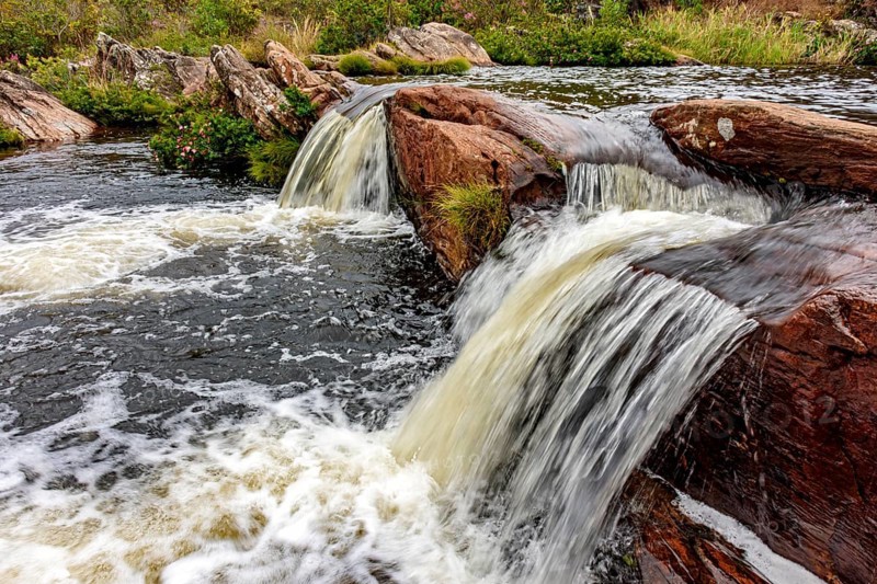Rocks and vegetation in the river in the Biribiri mountain range in Diamantina, Minas Gerais, Diamantina, Minas Gerais, Brazil, South America