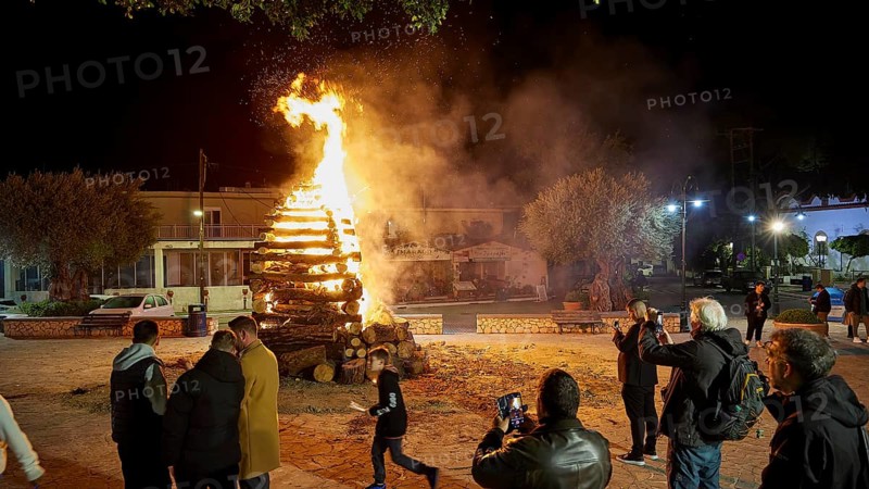 People gather around a burning pile of wood at night, some take photos, Easter fire Psinthos, Holy Saturday, Easter, Psinthos, Rhodes, Dodecanese, Greek Islands, Greece, Europe