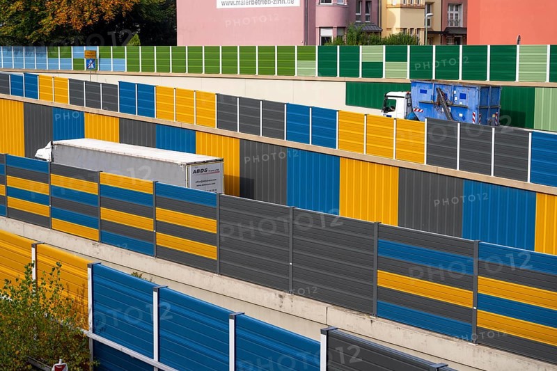 Colourful noise barriers on the A52 motorway, at the Essen-Rüttenscheid junction, the noise barriers were rebuilt in a colourful design as part of the motorway renovation, North Rhine-Westphalia, Germany, Europe
